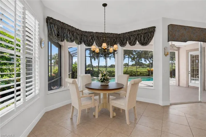 Enjoy breakfast or informal dining while looking out at the golf course and lake.