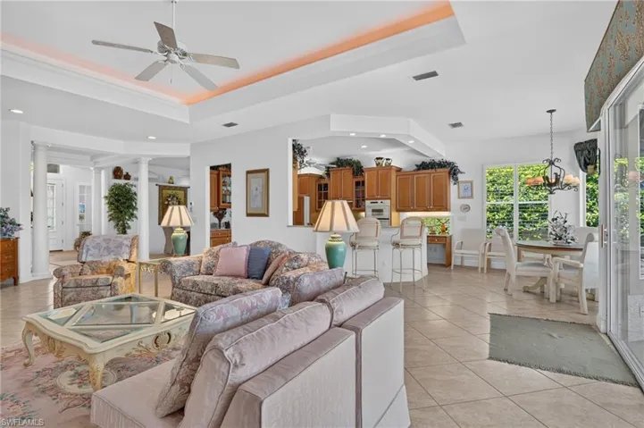 Living area, and kitchen and breakfast area.