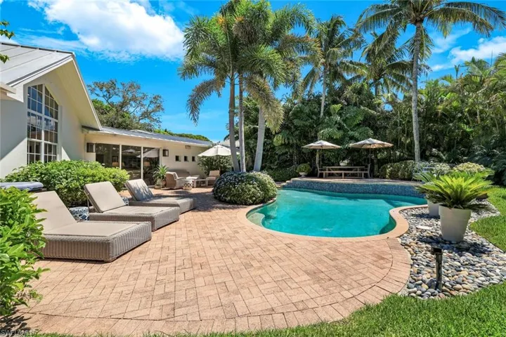Outdoor pool with a patio area