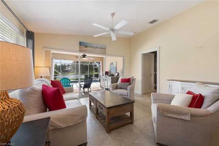 15339 Upwind Dr Bonita Springs FL 34135 - Open den area with ceiling fan