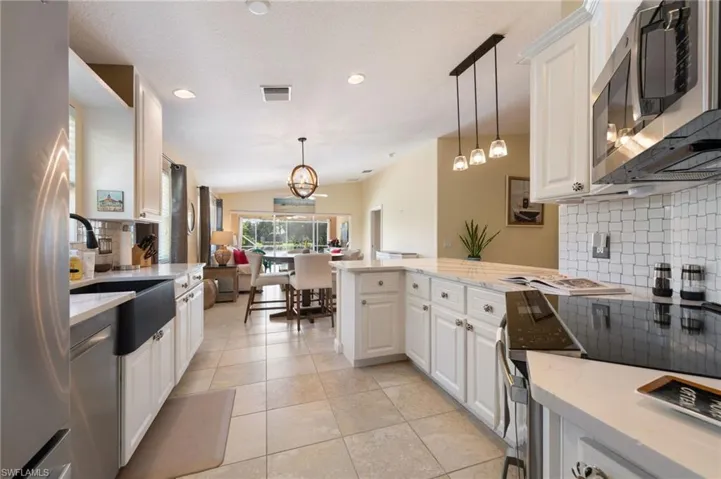 15339 Upwind Dr Bonita Springs FL 34135 - Stainless & Quartz kitchen