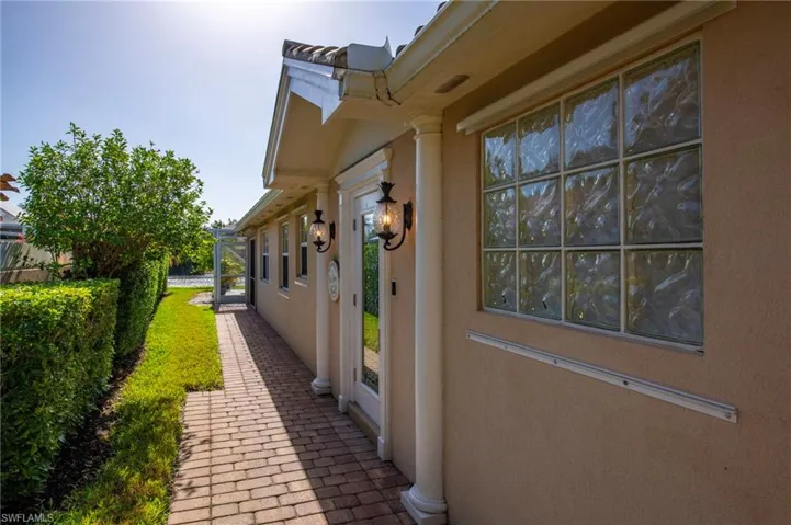 15339 Upwind Dr Bonita Springs FL 34135 - Front door with glass panel