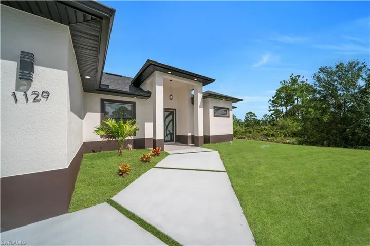 1129  Milwaukee  BLVD, Lehigh Acres, FL 33974