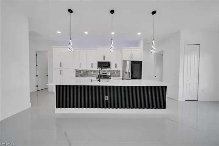 1129  Milwaukee  BLVD, Lehigh Acres, FL 33974