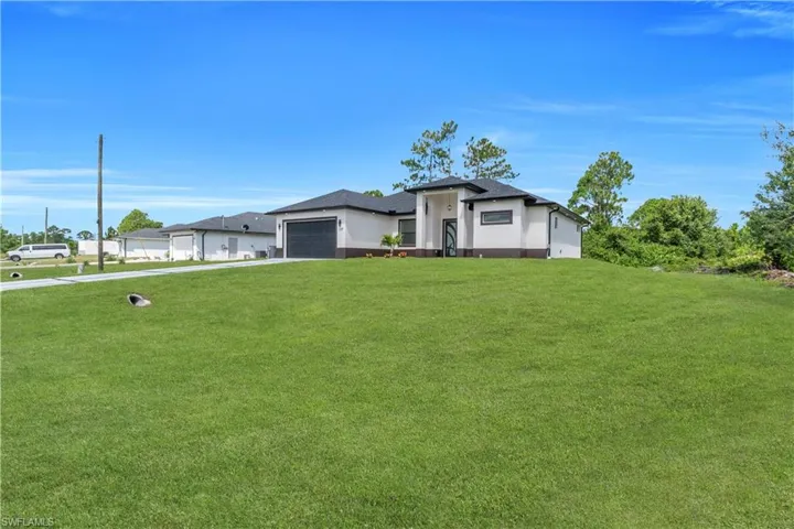 1129  Milwaukee  BLVD, Lehigh Acres, FL 33974