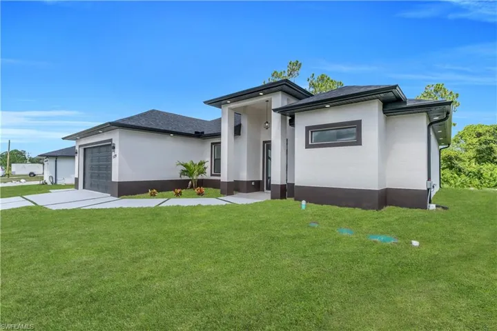 1129  Milwaukee  BLVD, Lehigh Acres, FL 33974
