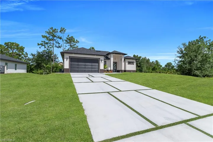 1129  Milwaukee  BLVD, Lehigh Acres, FL 33974