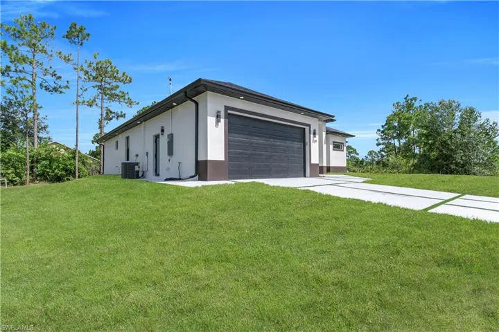 1129  Milwaukee  BLVD, Lehigh Acres, FL 33974