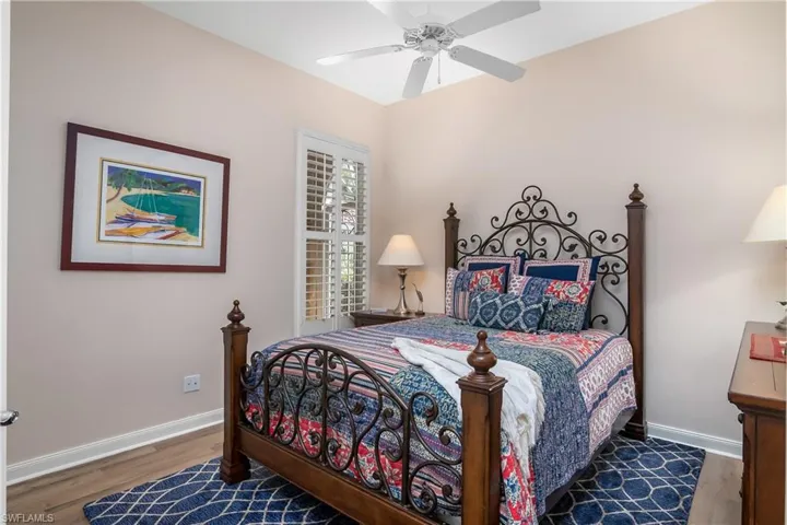 Guest Bedroom#1 with ceiling fan and engineered waterproof flooring