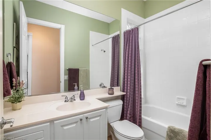 Full second bathroom with shower / bath  combination for guests' use