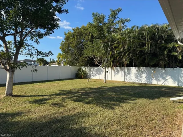 View of fenced backyard