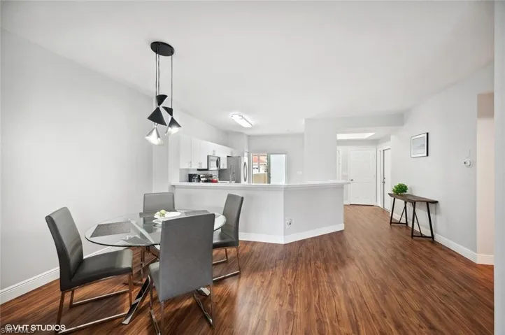 Dining Area and Breakfast Bar off Kitchen