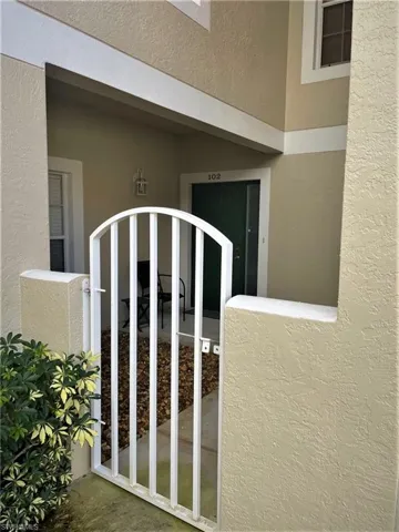 Front Entry through Private Courtyard setting.