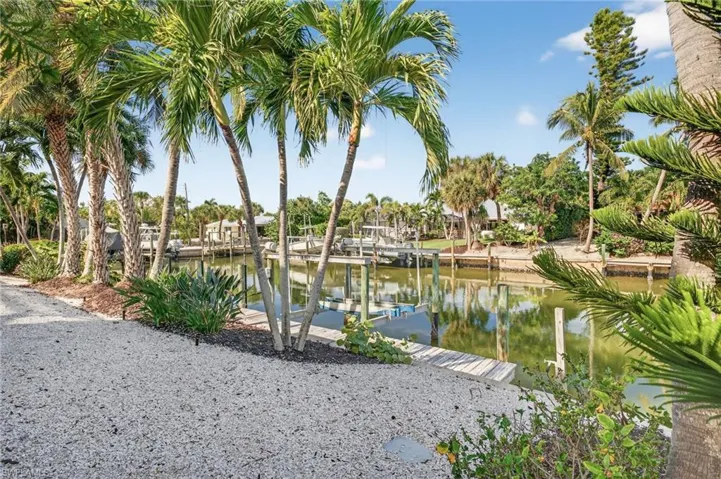 Water view with a dock and boat lift
