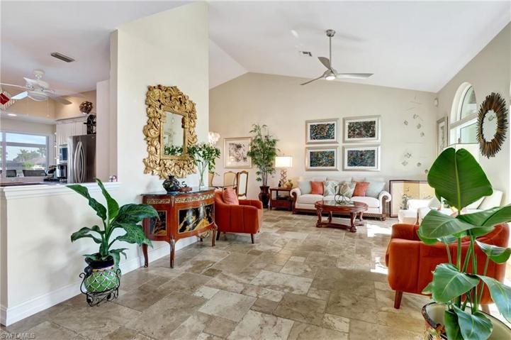 Cathedral ceilings enhance the open airy feeling throughout this home.