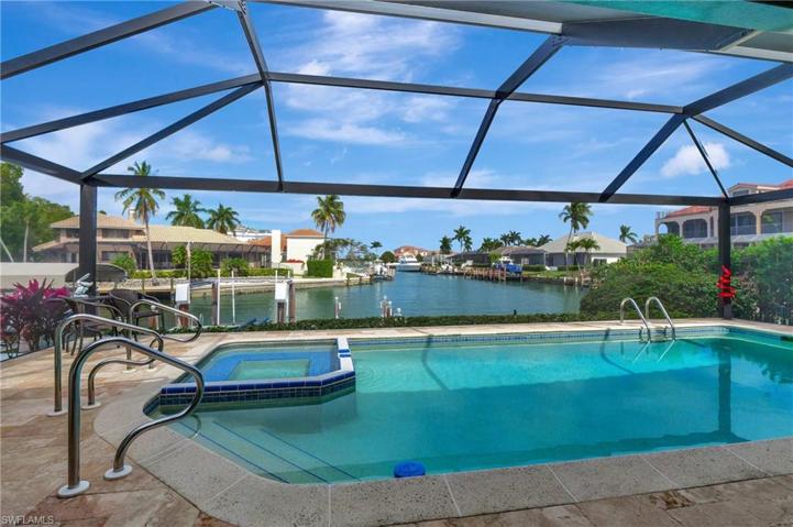 Pool and Spa with Panoramice Pool screen showing long water view to Marco River!