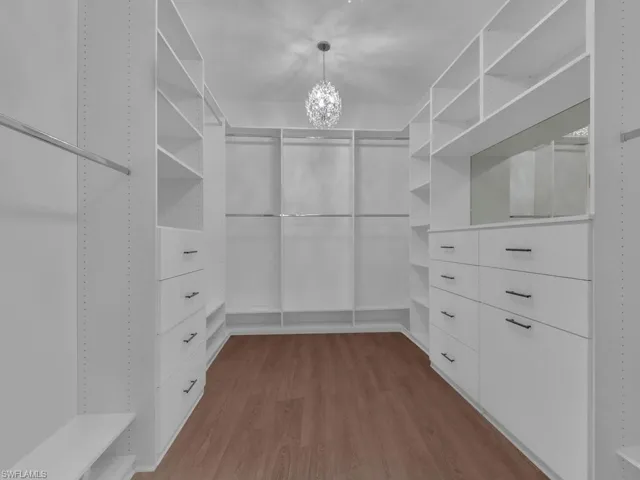 Master Walk-In Primary Closet