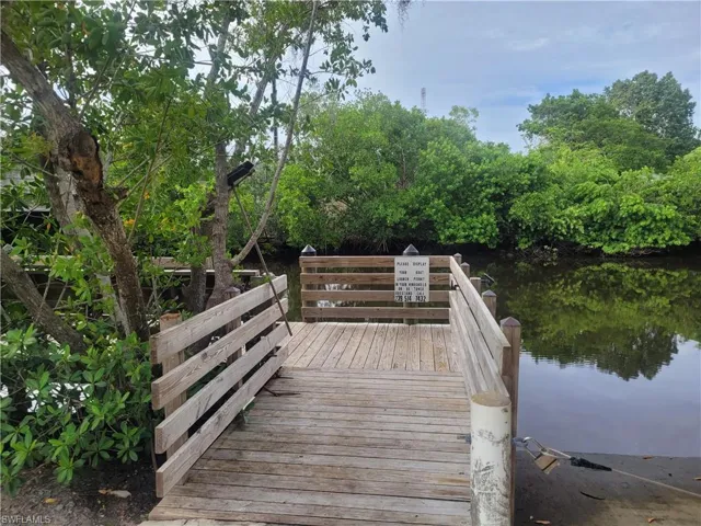 Dock featuring a water view