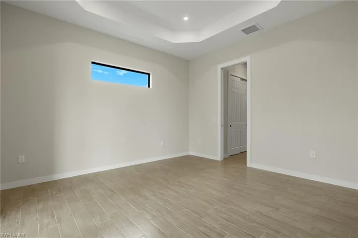 Flooring upgraded to premium, color-matched Luxury Vinyl Plank [LVP].