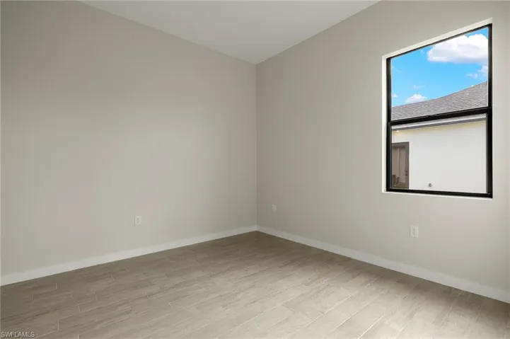 Flooring upgraded to premium, color-matched Luxury Vinyl Plank [LVP].