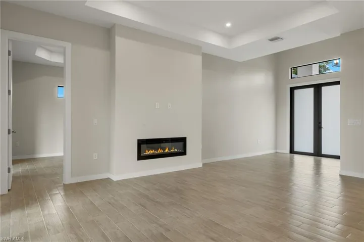 Flooring upgraded to premium, color-matched Luxury Vinyl Plank [LVP].