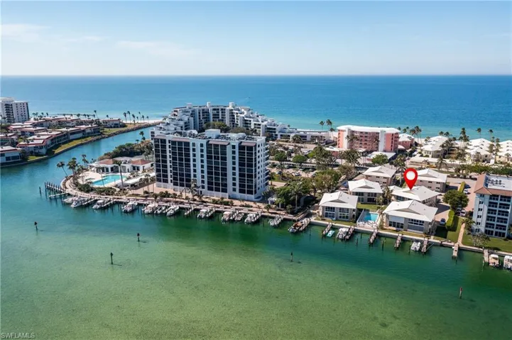 A picture perfect setting on Moorings Bay, near Doctor's Pass and the Gulf waters beyond!