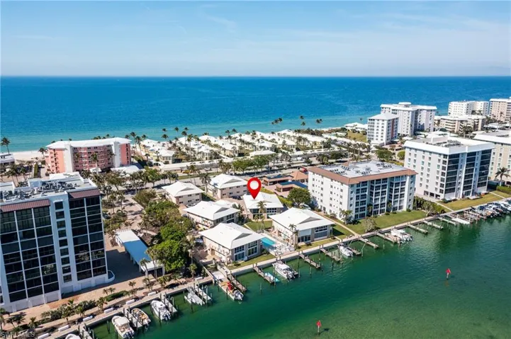 Beach access is available just south of the pink building, across the street.