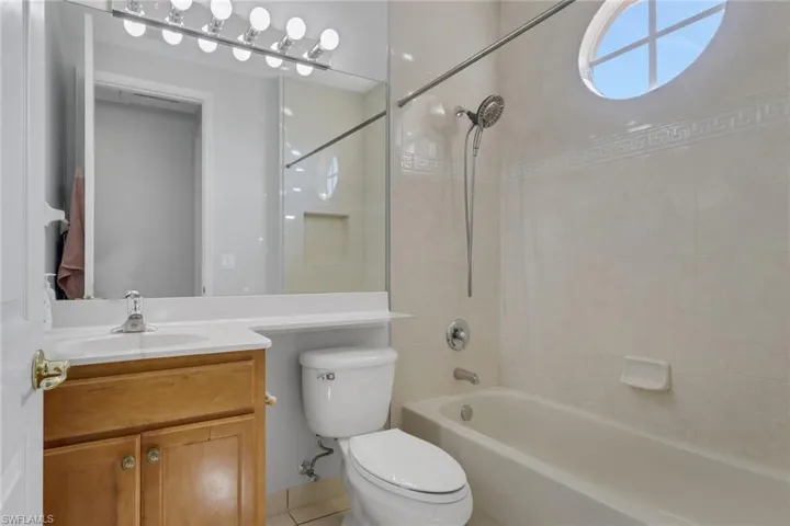 Full bathroom featuring vanity and shower / bath combination