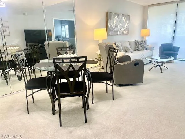 Dining room featuring carpet