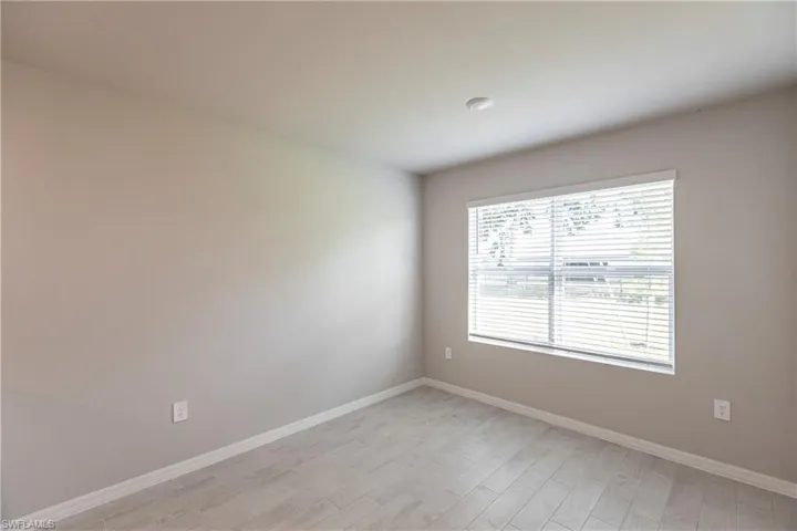 Spare room featuring light hardwood / wood-style floors