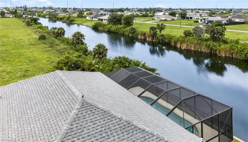 Aerial view of residential area with a nearby body of water