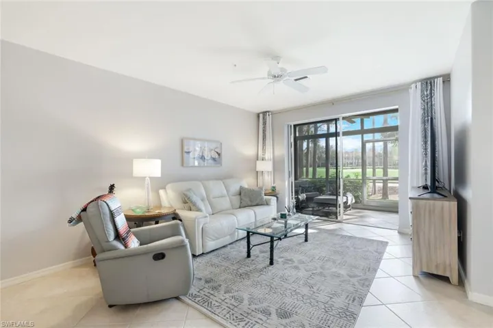 Tiled living room with ceiling fan