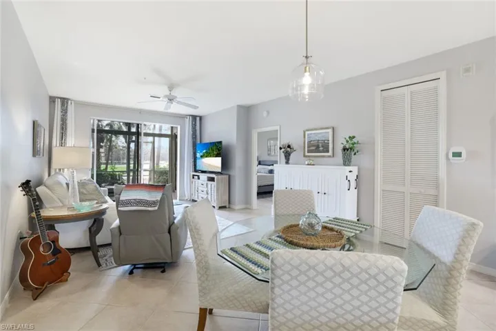 Tiled living room with ceiling fan