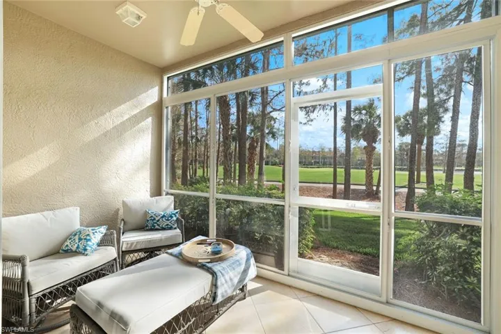 Sunroom with ceiling fan and a wealth of natural light