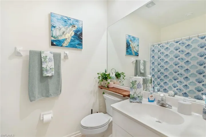 Bathroom with vanity and toilet