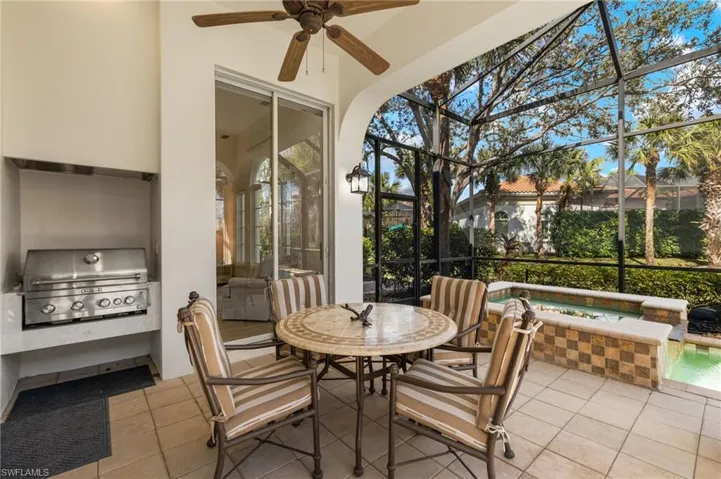 Sunroom with ceiling fan and plenty of natural light