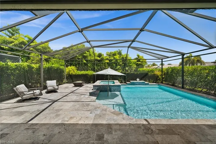 Oversized Lanai, pool, hot tub and gas firepit