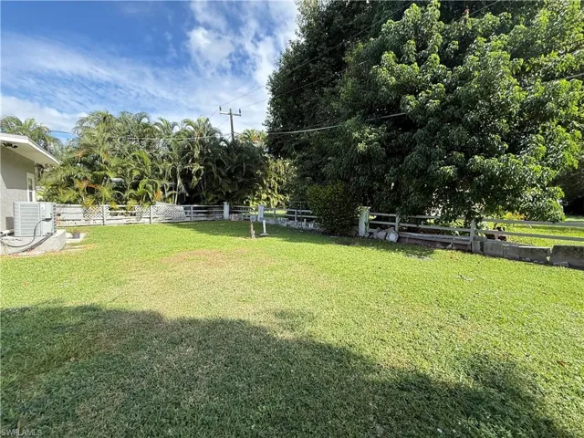 View of fenced backyard