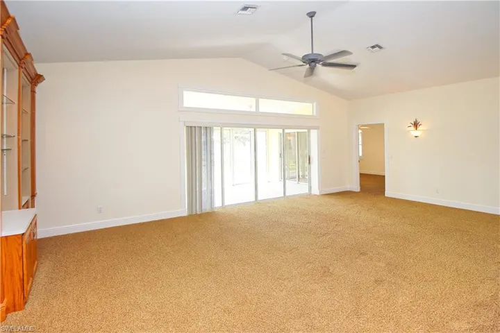 Living room with view of pond