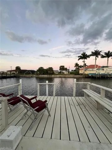 Dock featuring a water view