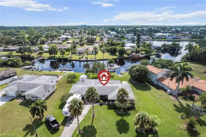 Aerial view of residential area with a large body of water