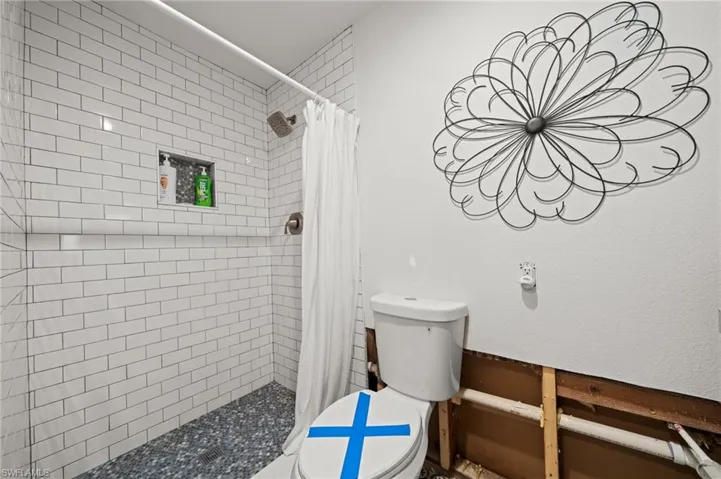 Bathroom with a stall shower