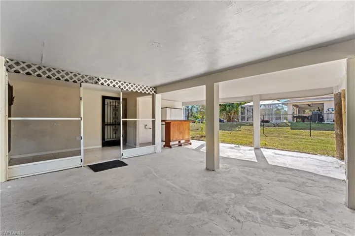 View of patio with glass enclosure