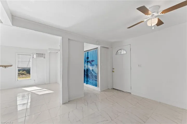 Spare room featuring ceiling fan