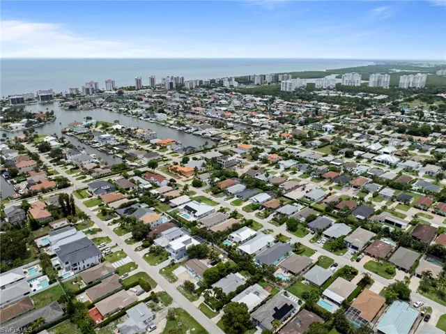 Aerial perspective showcasing a residential community with numerous properties