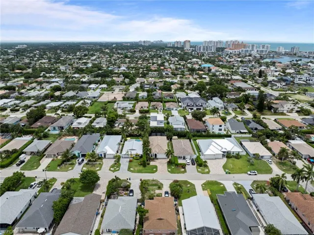 Expansive residential area featuring a mix of single-story and multi-story homes, mature landscaping, and an organized street grid