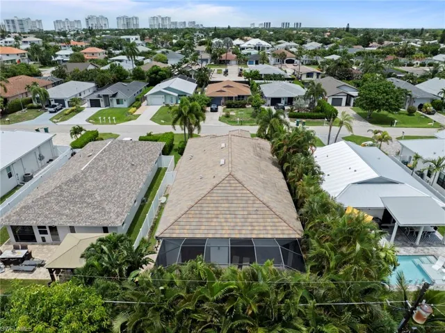 Terracotta tile roof with screened-in patio enclosure