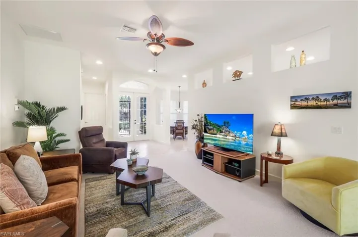 Spacious living room with decorative niches
