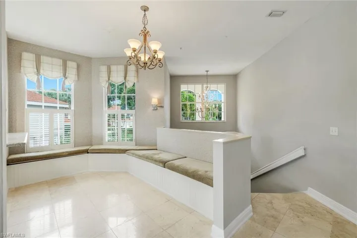 Entrance with banquette for casual dining or reading nook
