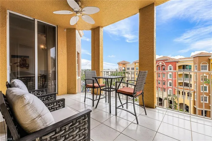 Balcony featuring ceiling fan